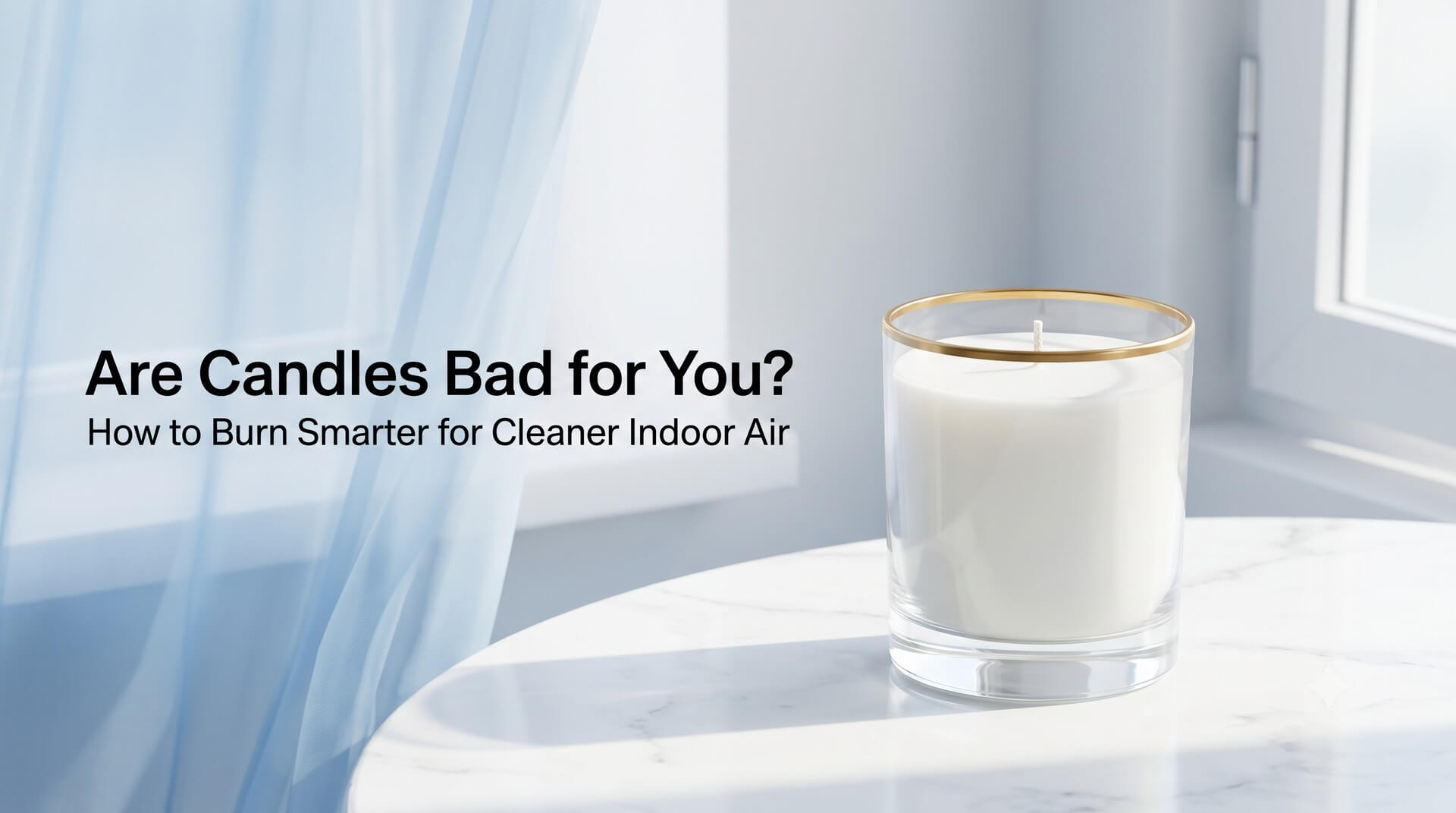 White candle in a glass jar with gold rim on a marble table near a window with sheer curtains. Title reads: "Are Candles Bad for You? How to Burn Smarter for Cleaner Indoor Air."